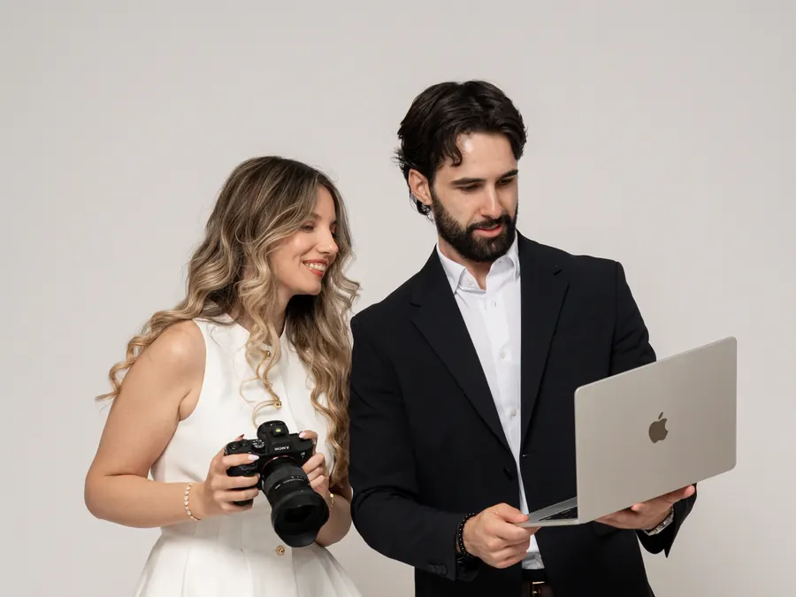 Contelp team creating social media content with camera and laptop